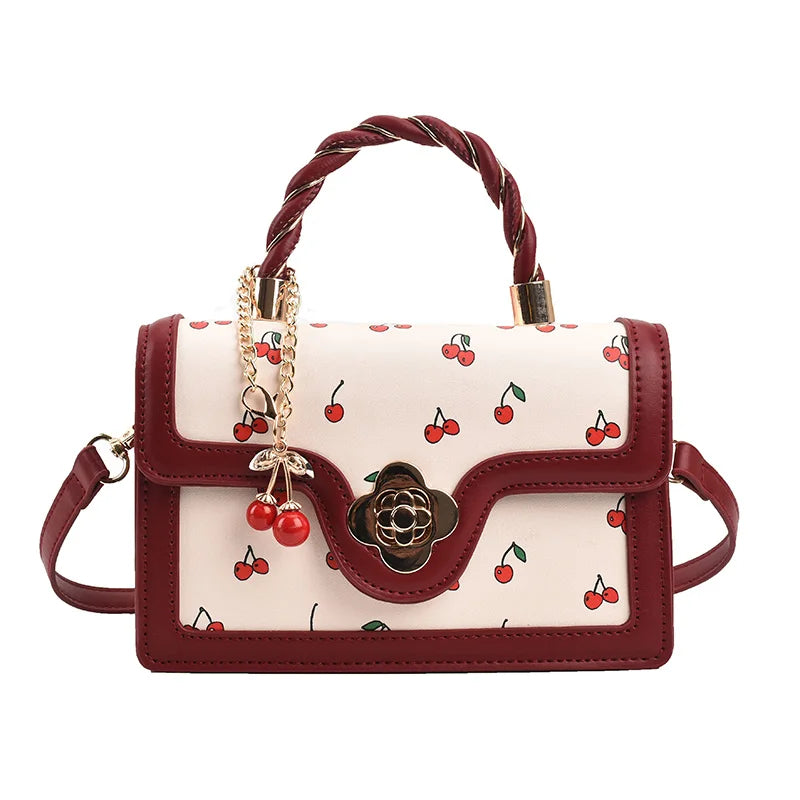 This Is a Red Handbag with a Cute Cherry Design for Dating and Shopping.